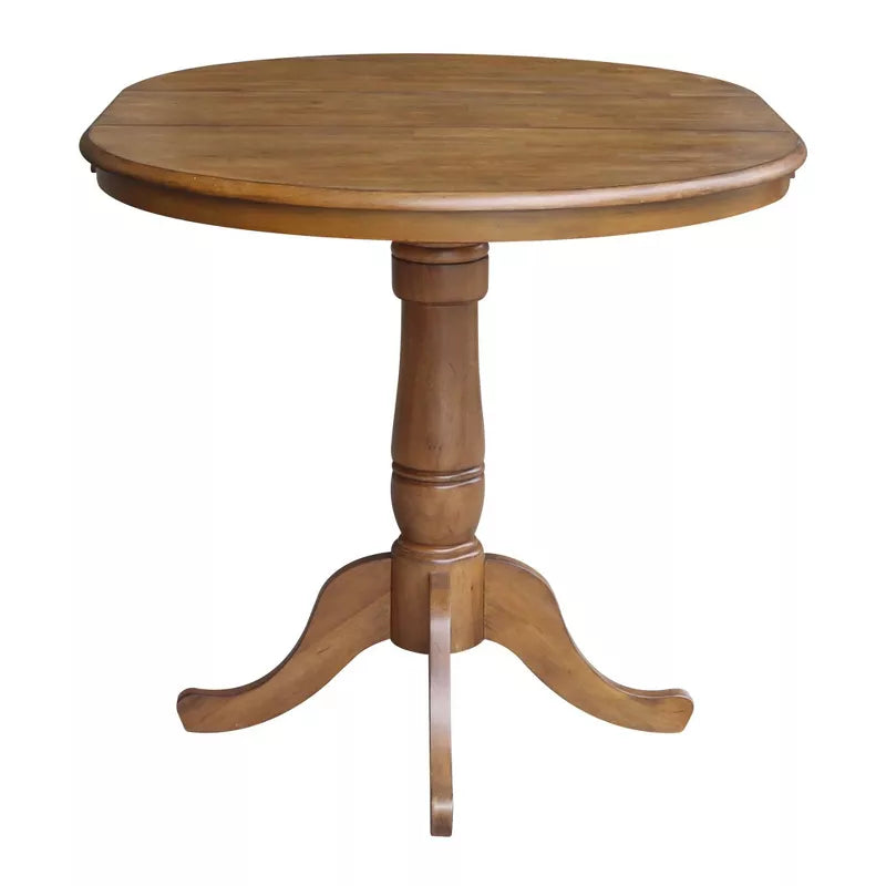 Wooden round table with a pedestal base on a white background