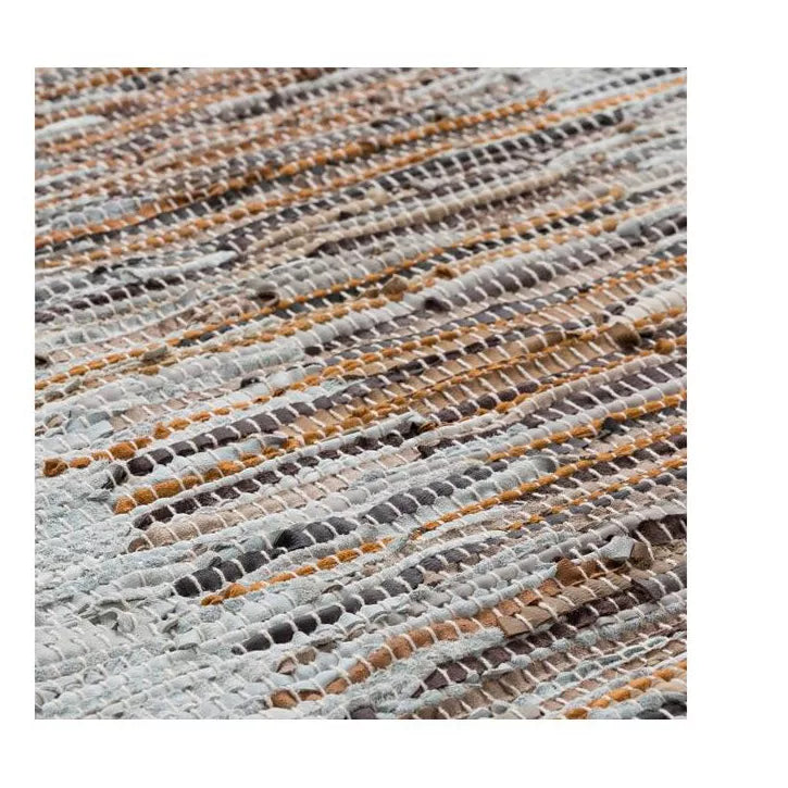 Textured wall hanging with a pattern of horizontal stripes on a white background