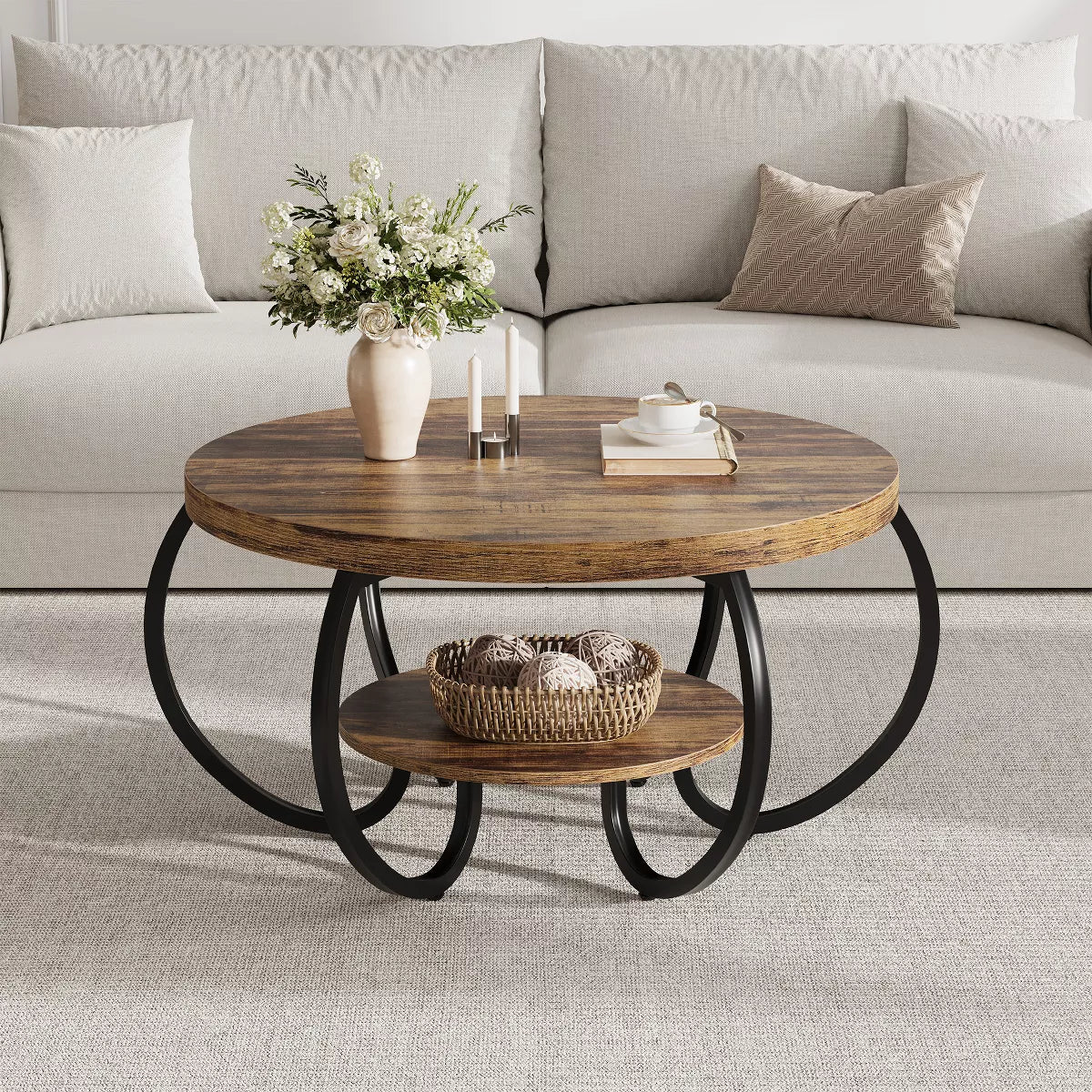 Wooden coffee table with black metal legs in a living room setting.brown