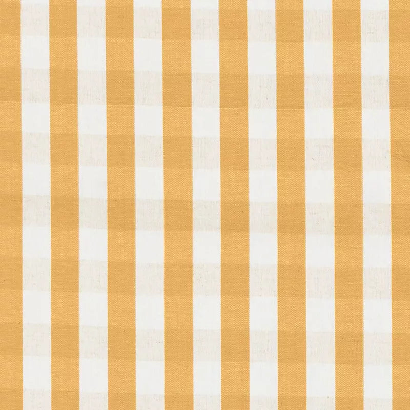 Fabric with vertical orange and white stripes on a white background