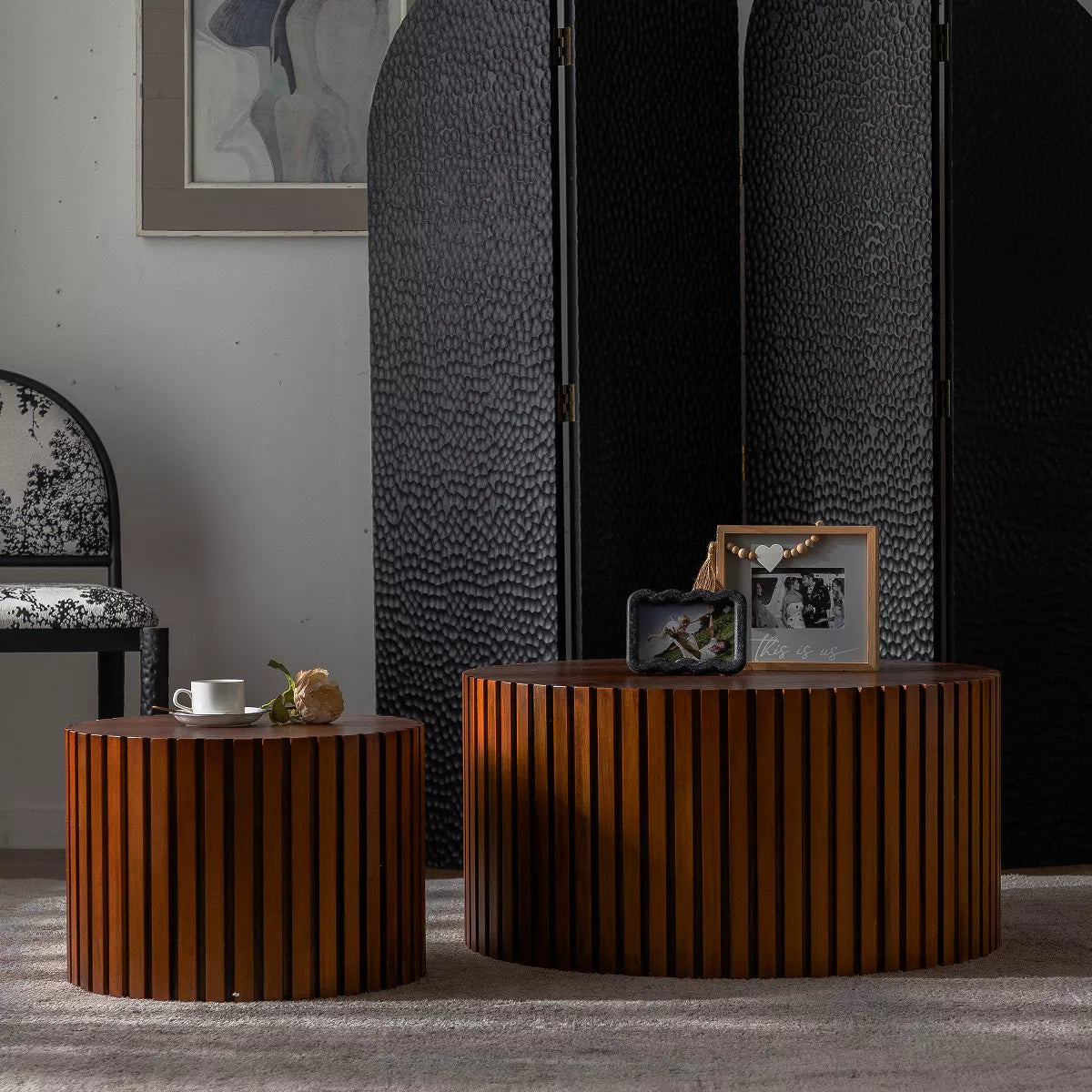 Two wooden side tables with a striped pattern on a white background