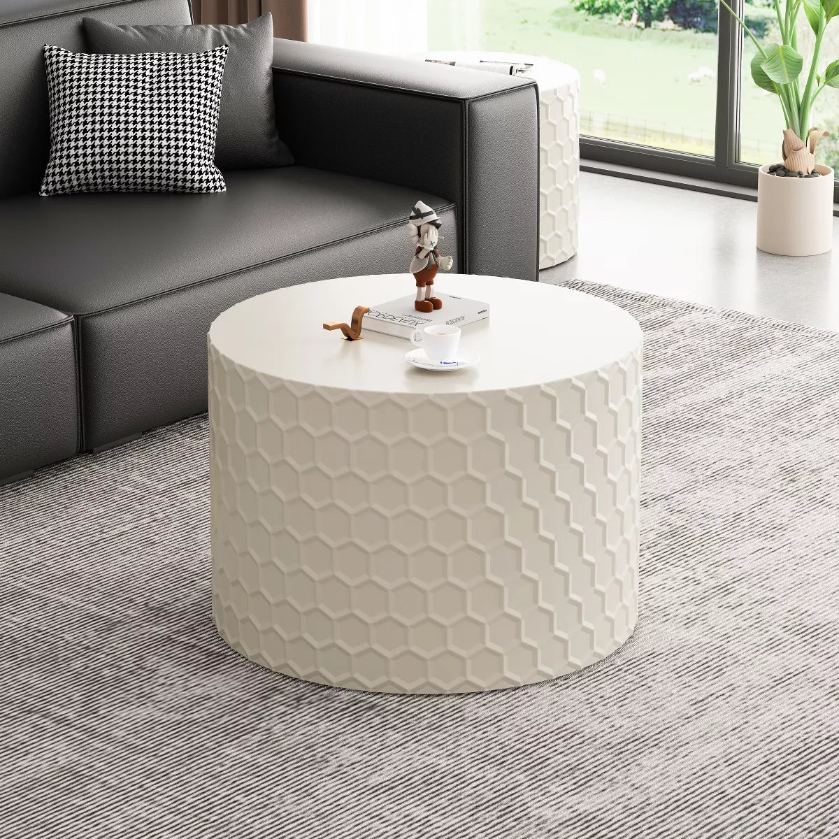 Two white ceramic planters with geometric pattern on a white background White