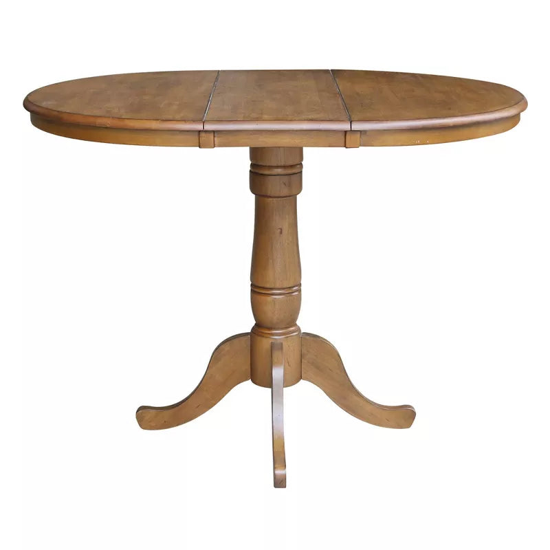 Wooden round table with a pedestal base on a white background
