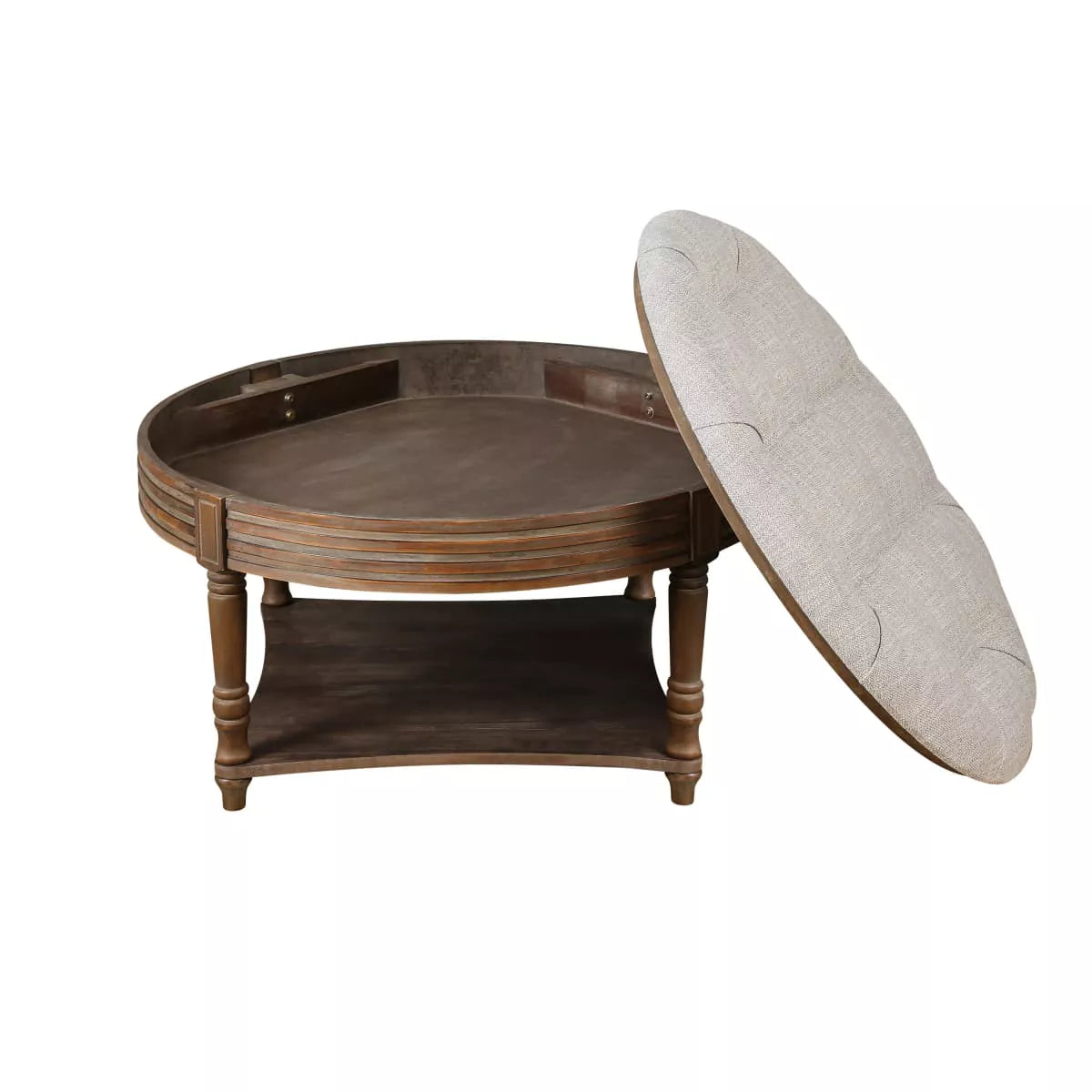 Round wooden coffee table with a gray cushion in a living room setting. gray