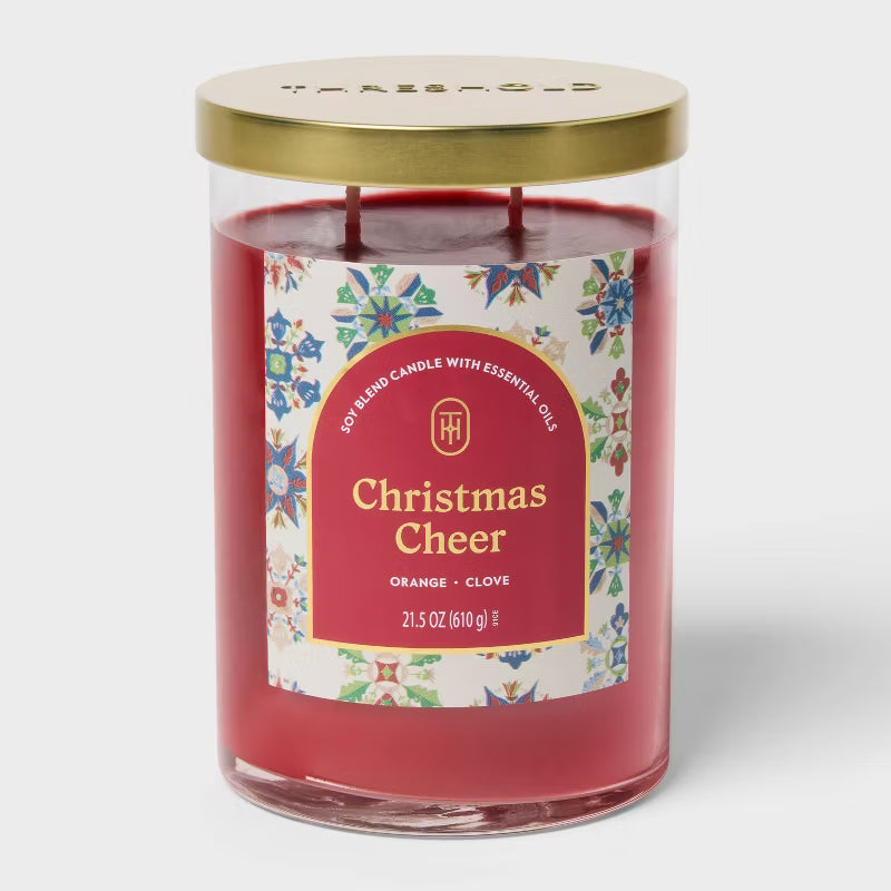 Candle with 'Christmas Cheer' label on a white background 21.5oz