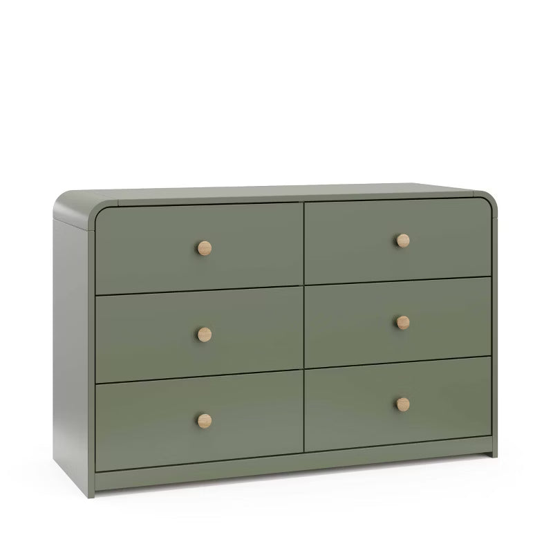 Green dresser with six drawers and wooden knobs on a white background