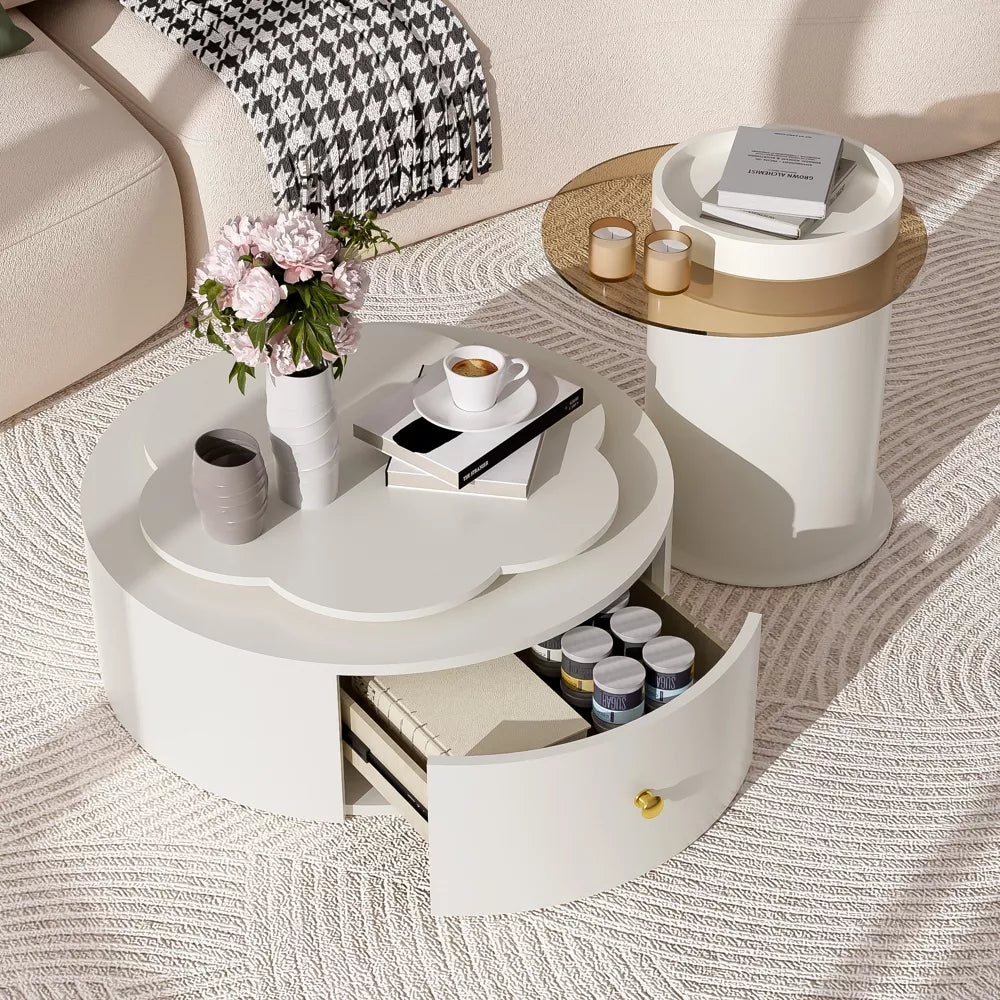 Round coffee table with decorative items in a living room setting
