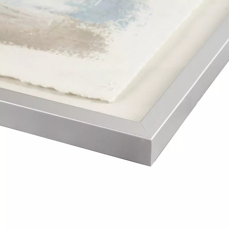 Framed artwork with a white border on a light background