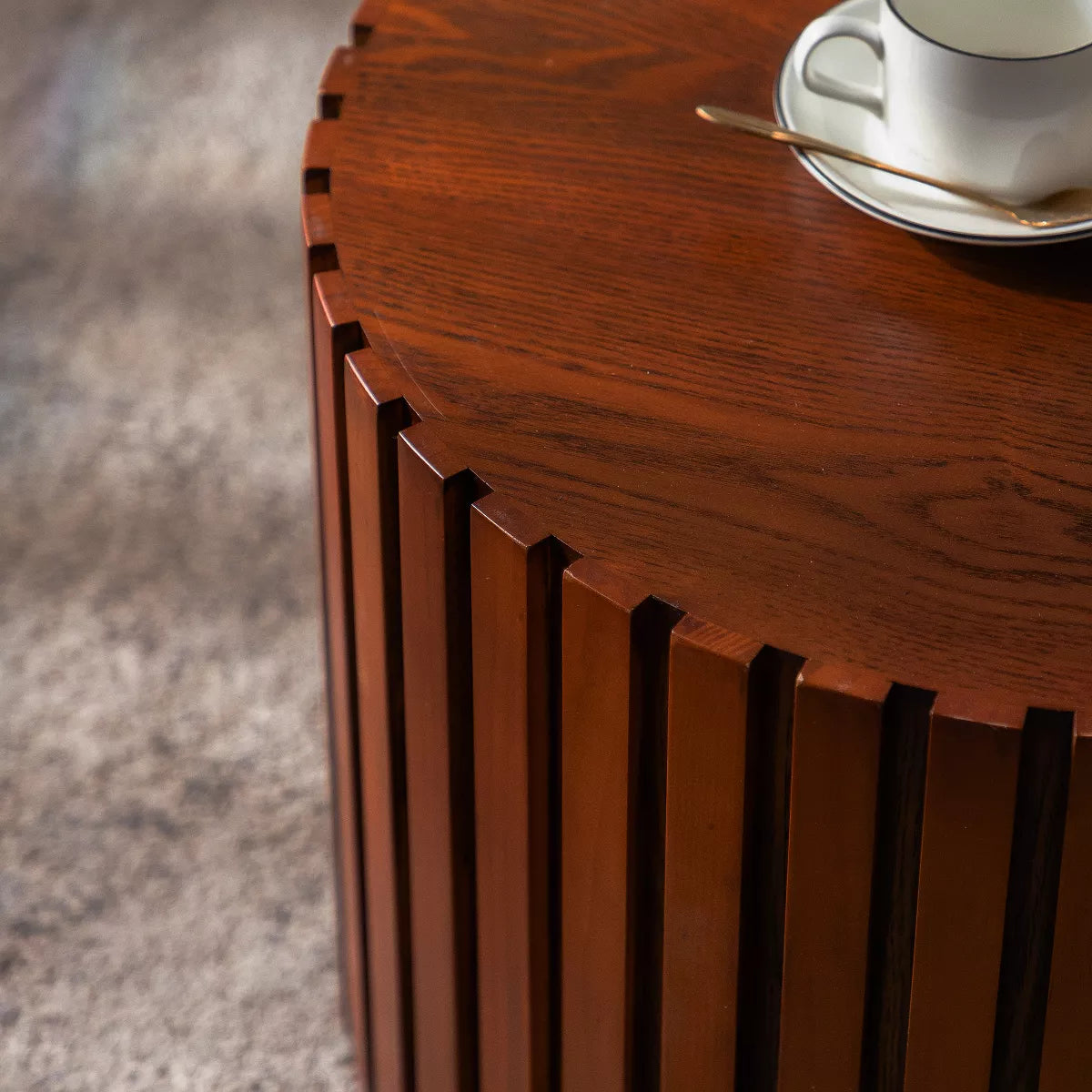 Two wooden side tables with a striped pattern on a white background