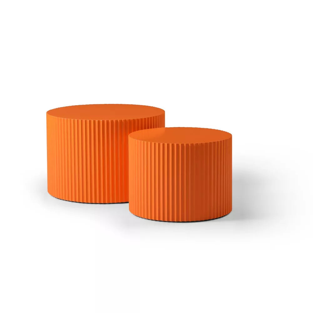 Close-up of an orange textured container with a clear lid on a light background orange