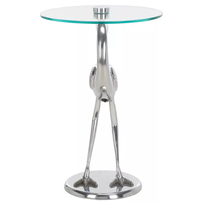 Glass top table with metal base on a white background