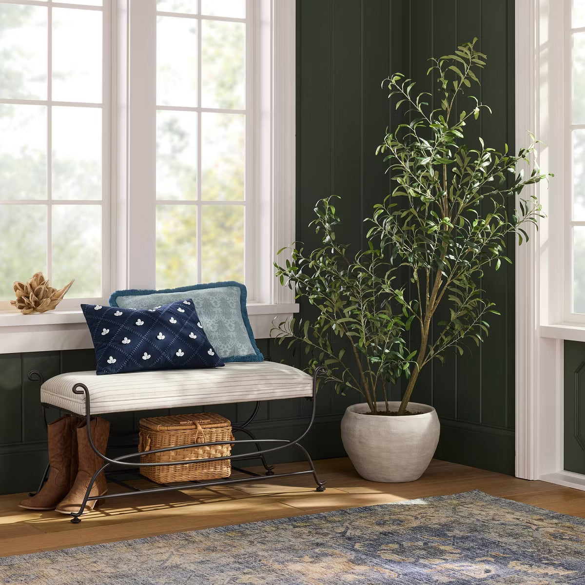 Striped fabric metal bench placed in an elegant entryway room setting