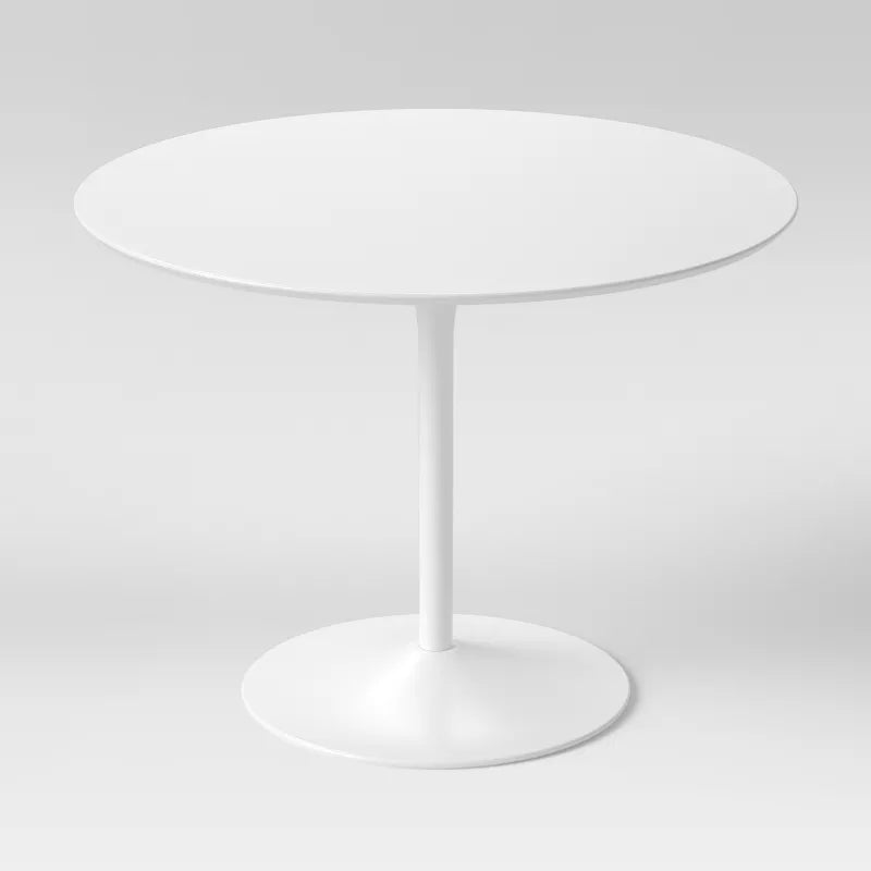 White round table on a gray background