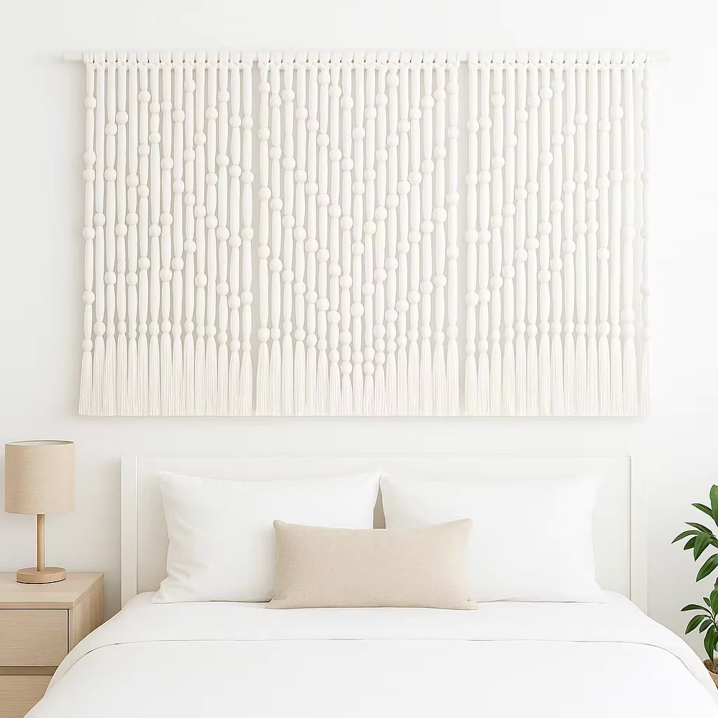Bedroom with a textured wall art piece above a bed.