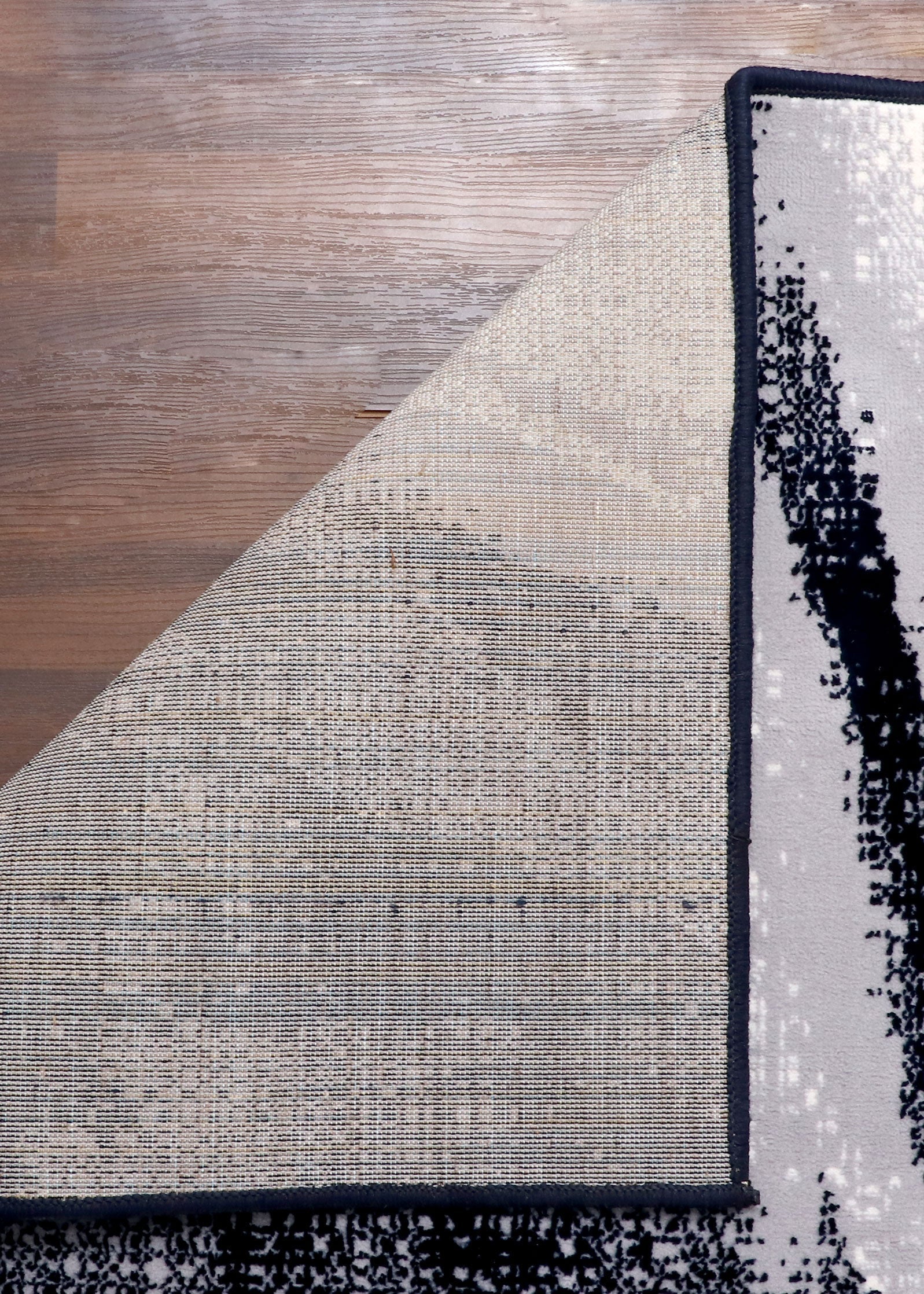 Turkish modern abstract area rug with artistic design and jute backing