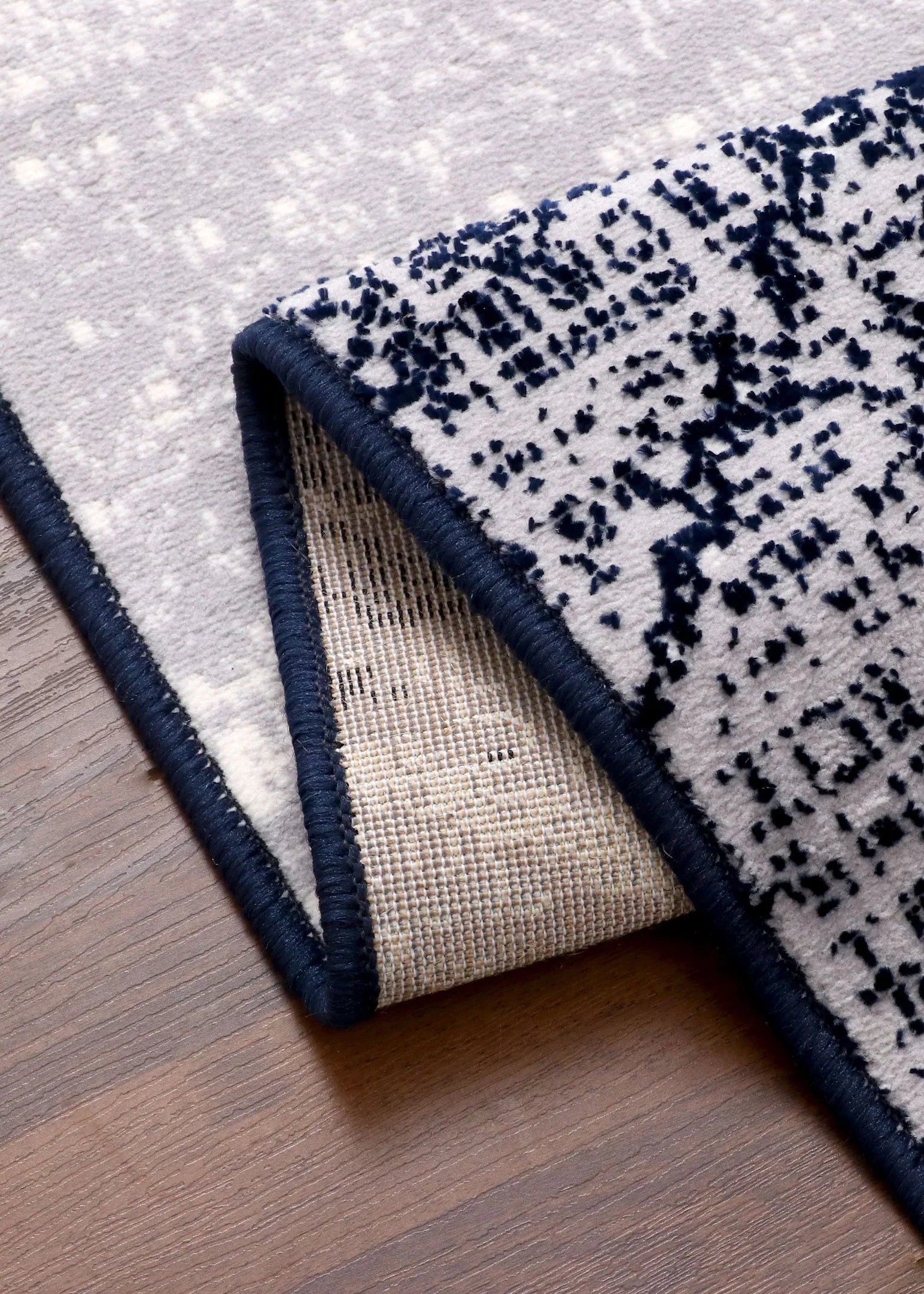 Turkish modern abstract area rug with artistic design and jute backing