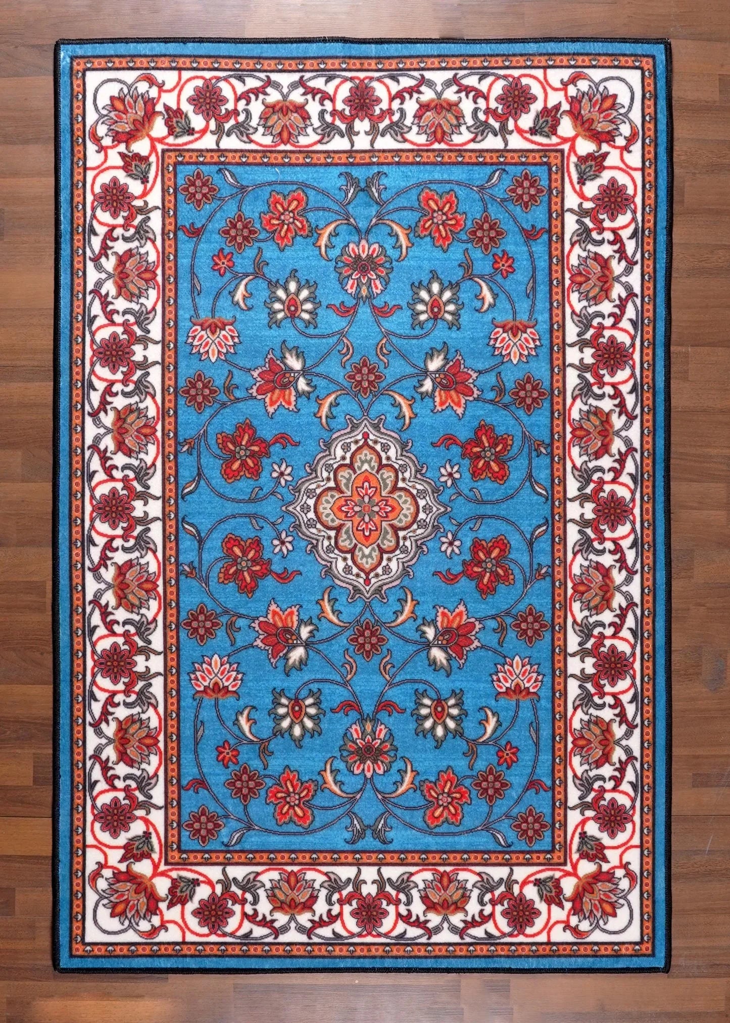 Decorative rug with floral patterns on a wooden floor