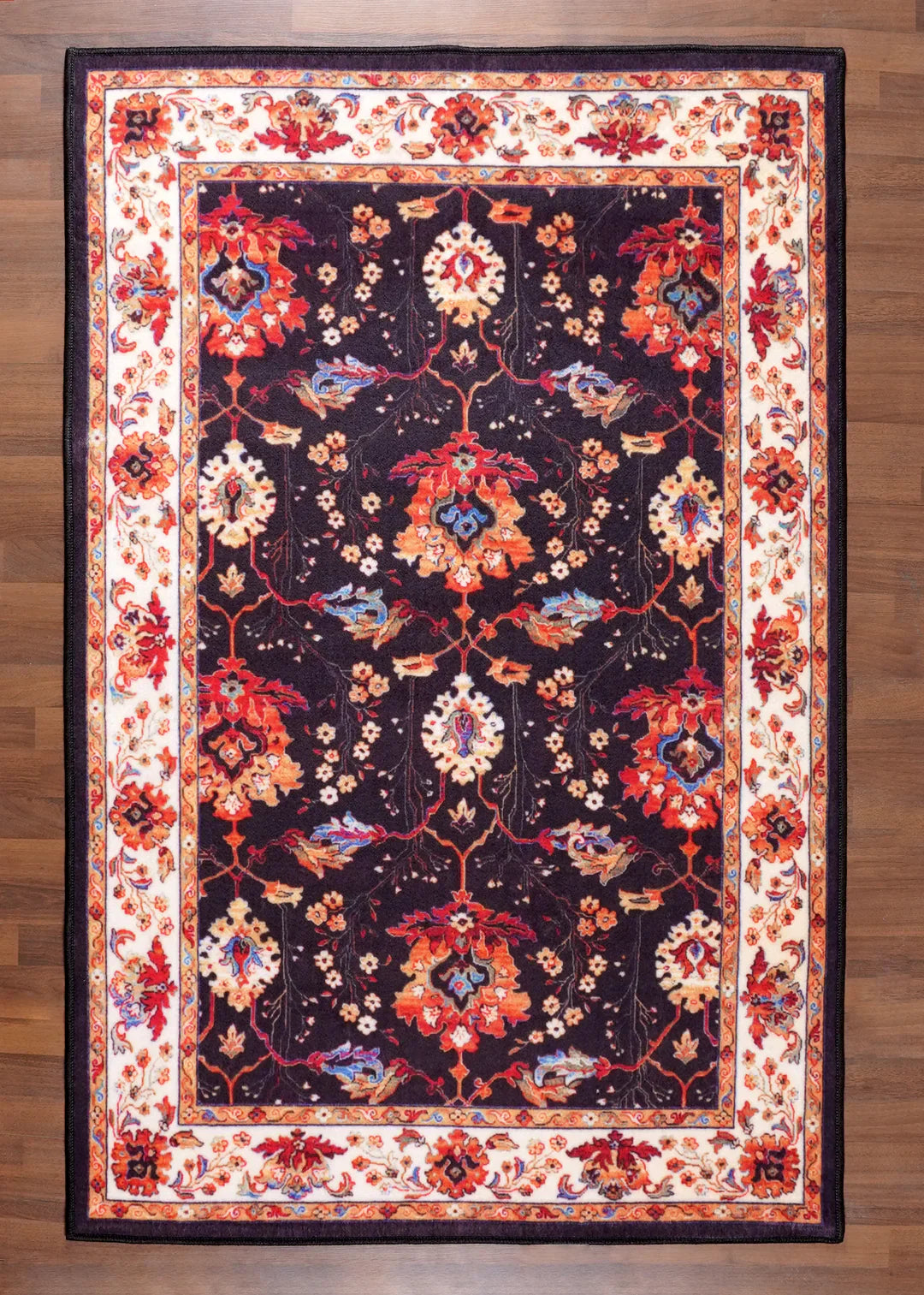 Decorative rug with floral patterns on a wooden floor