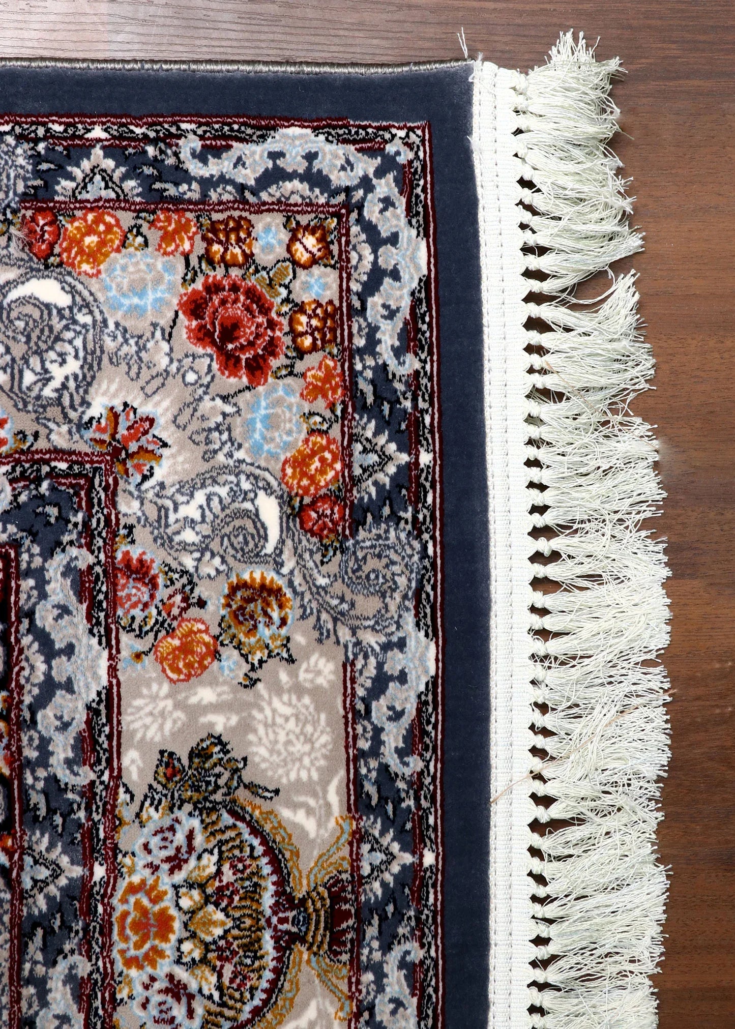 Persian vintage floral rug with antique-style design and soft synthetic pile