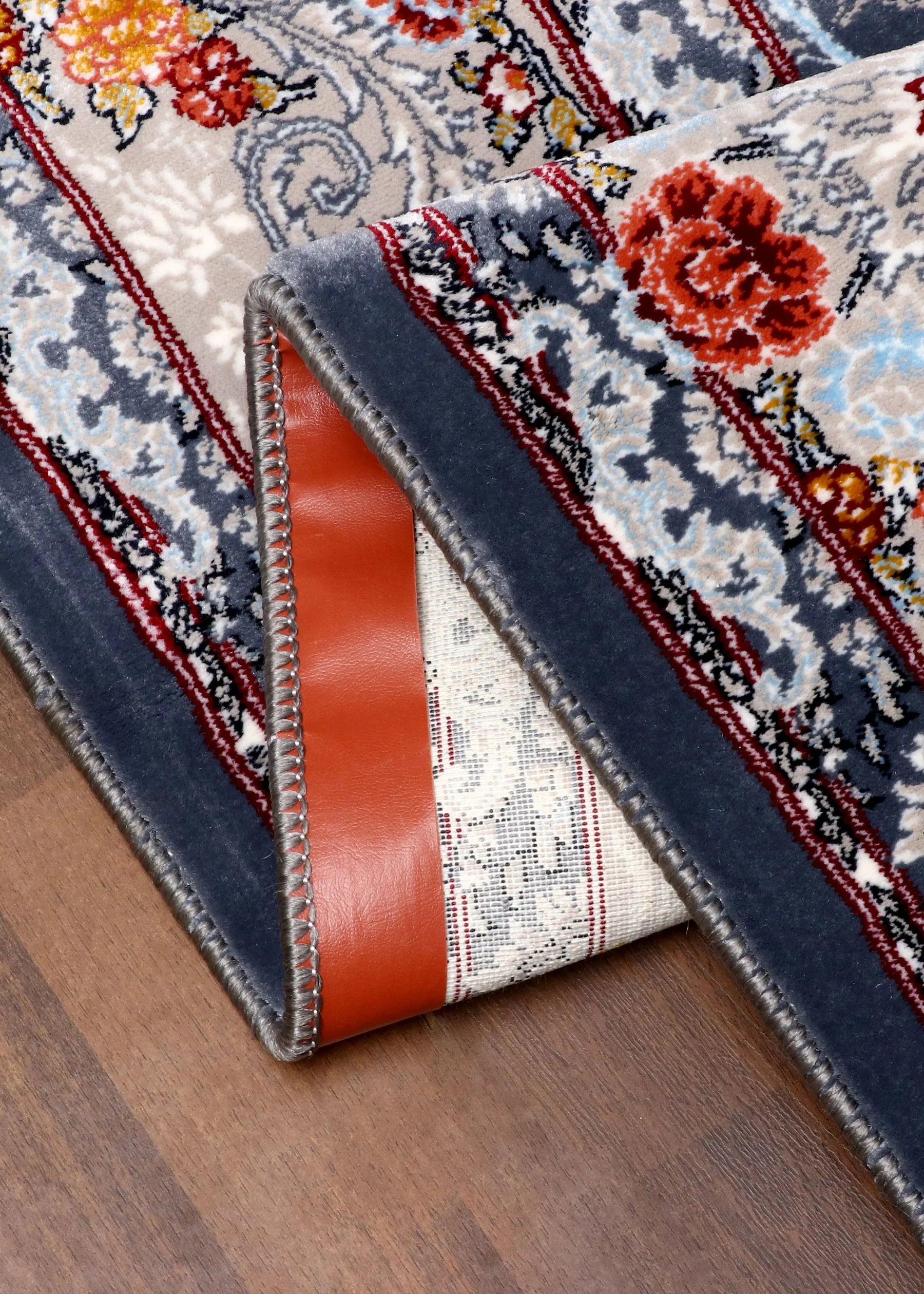 Persian vintage floral rug with antique-style design and soft synthetic pile