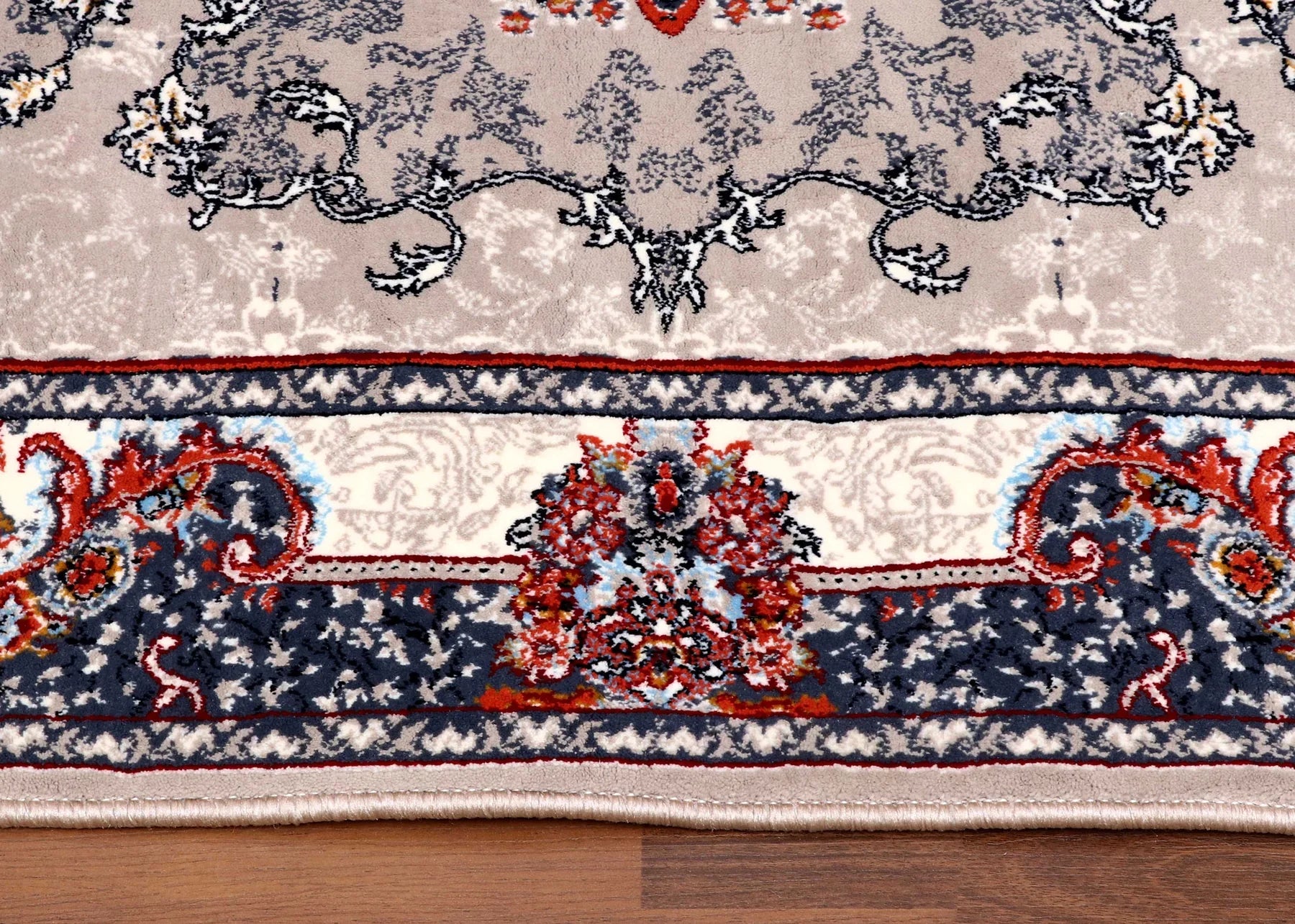 Traditional Persian rug in red, grey, and beige with medallion design – polyester with jute backing