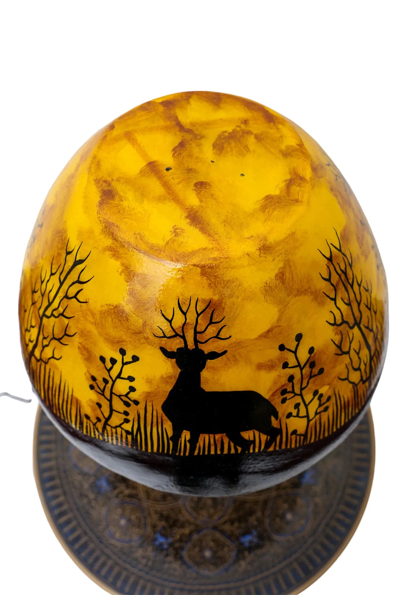 “Handpainted fluorescent camel skin lamp with wooden base – artisan-crafted decorative lamp with warm glow”