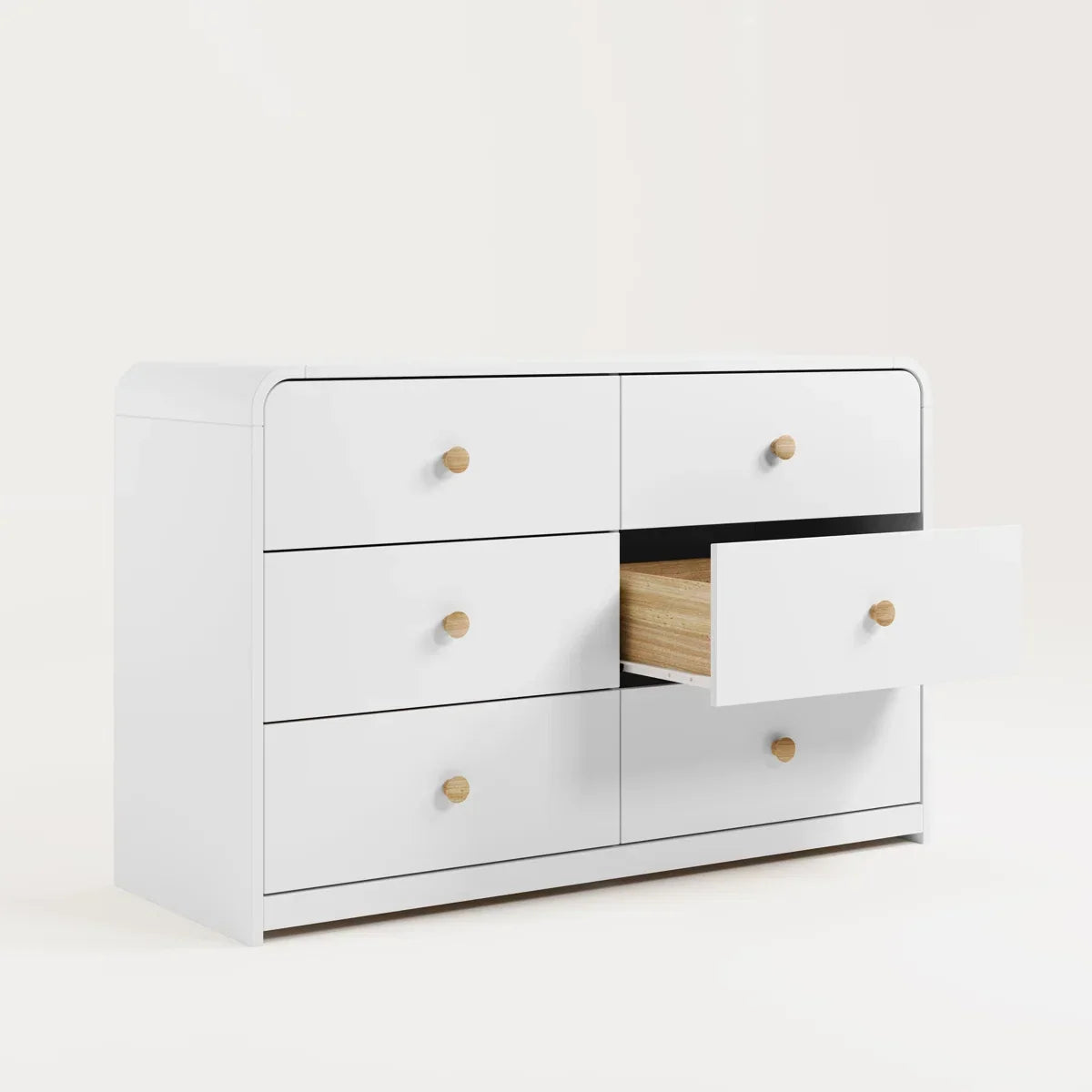A modern 6-drawer dresser in white with small round gold knobs, shown against a clean white background.