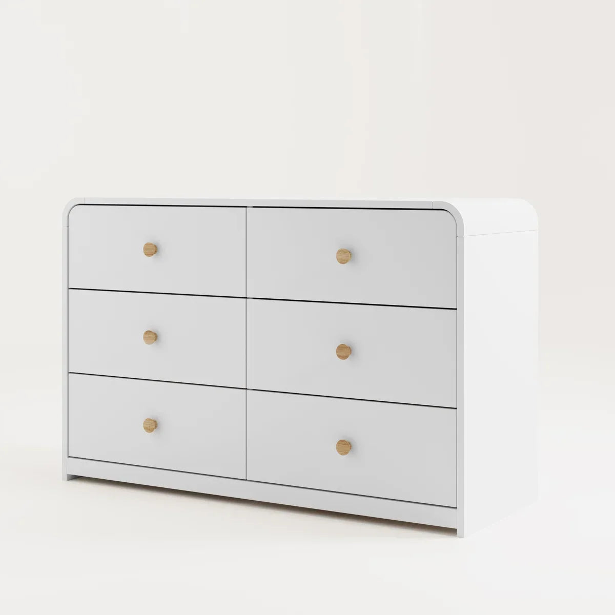 A modern 6-drawer dresser in white with small round gold knobs, shown against a clean white background.