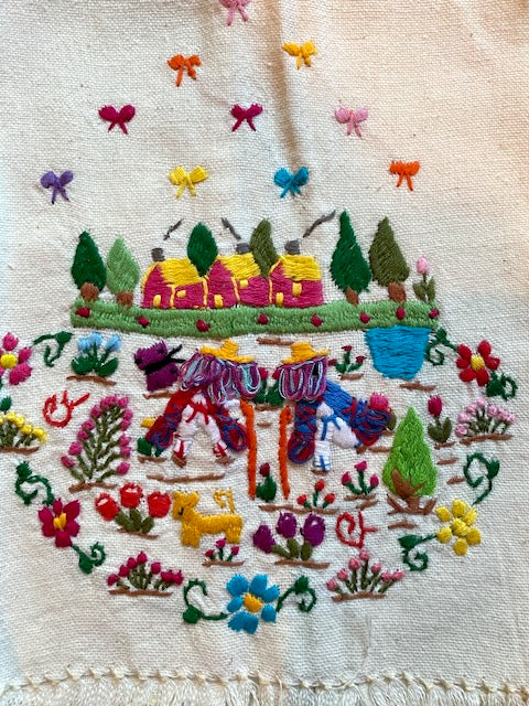 Embroidered scene with colorful houses, trees, and animals on a white fabric background Style L