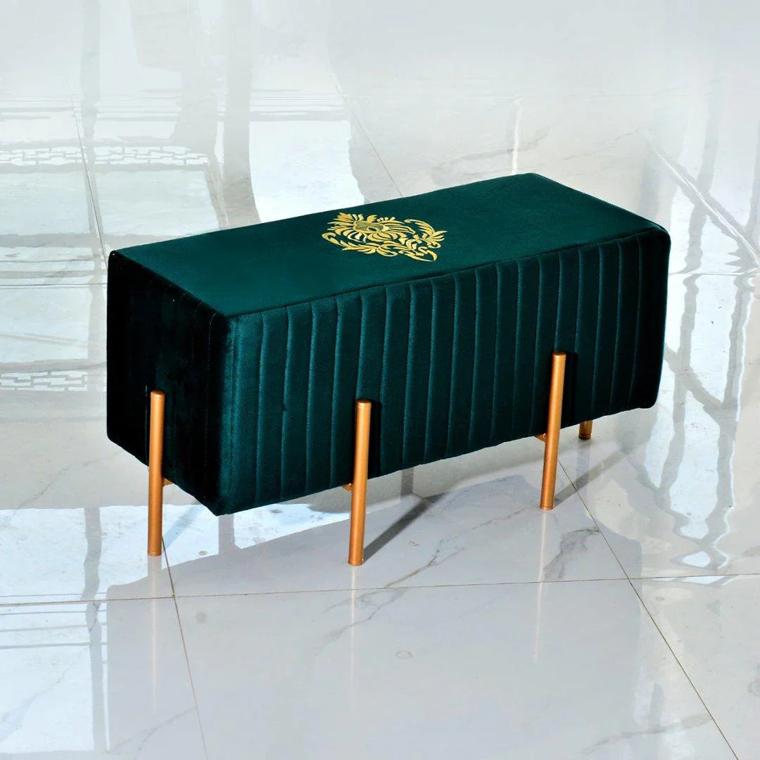 Green table cover with gold emblem on a marble floor