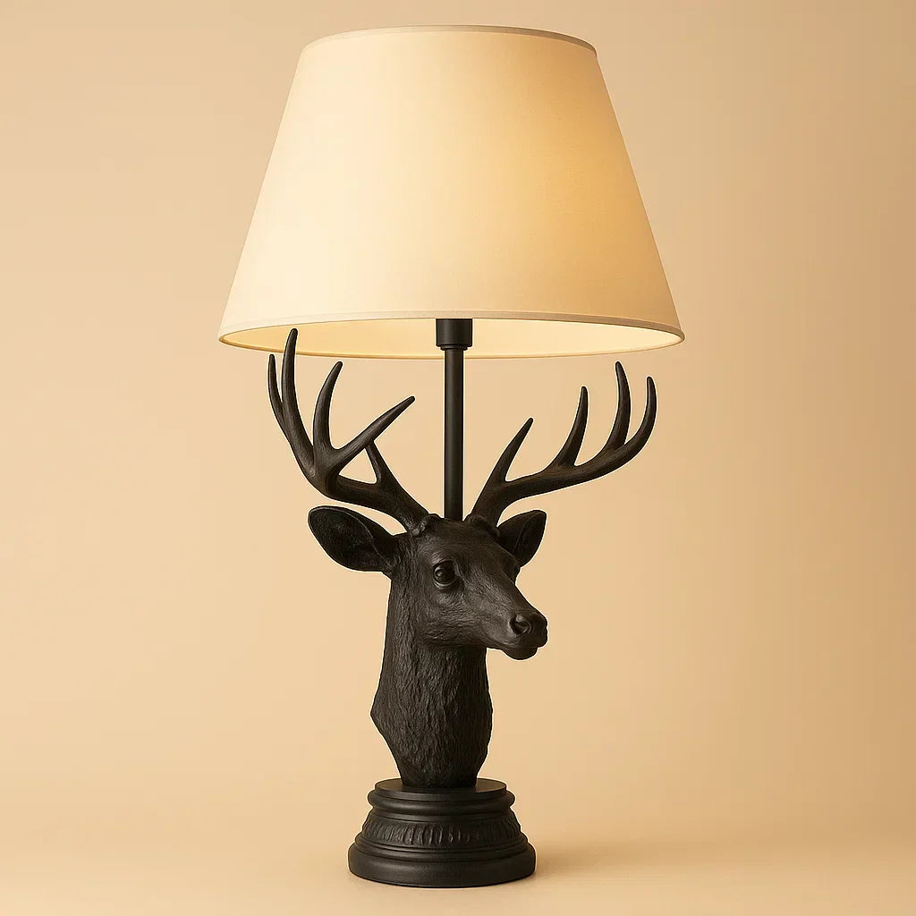 Decorative table lamp with deer head design on a beige background Black