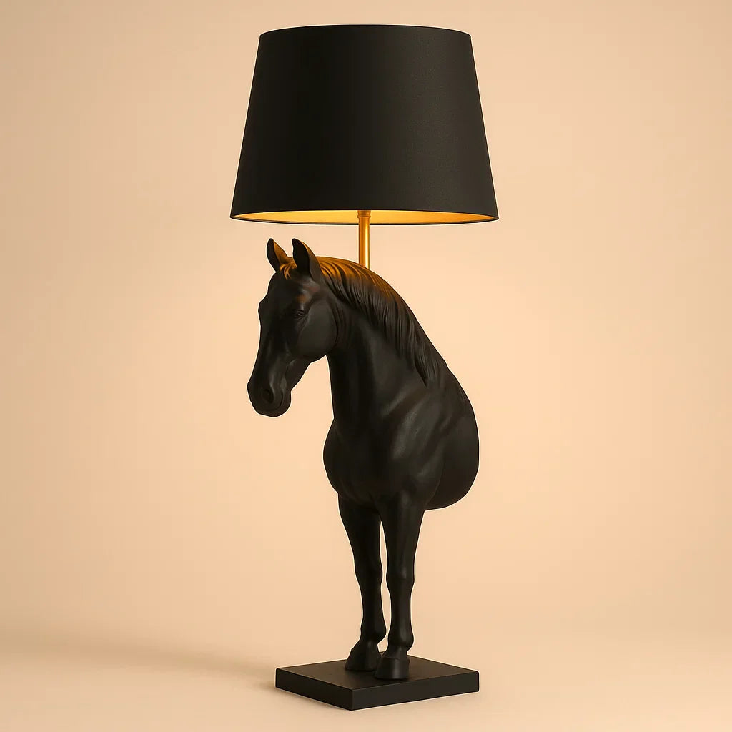 Black horse-shaped table lamp with a black shade on a beige background