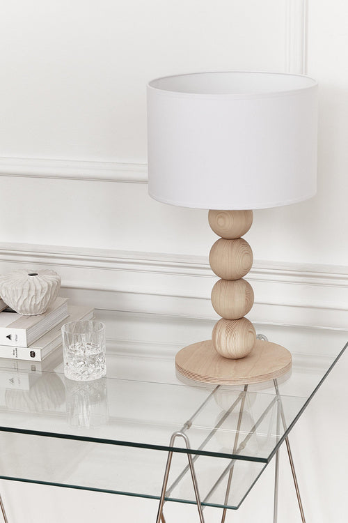“FORE Natural table lamp by Nureyaa – four stacked pine wood balls with a white shade, 20.8-inch minimalist design for modern cozy interiors.”
